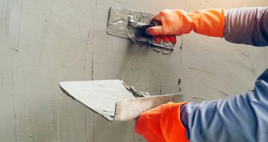 Hand image worker Concrete plaster Hand image worker Concrete plaster