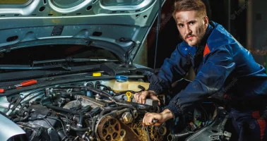 mechanic-working-car-motor-auto-repair-service-center_98890-512 mechanic-working-car-motor-auto-repair-service-center_98890-512